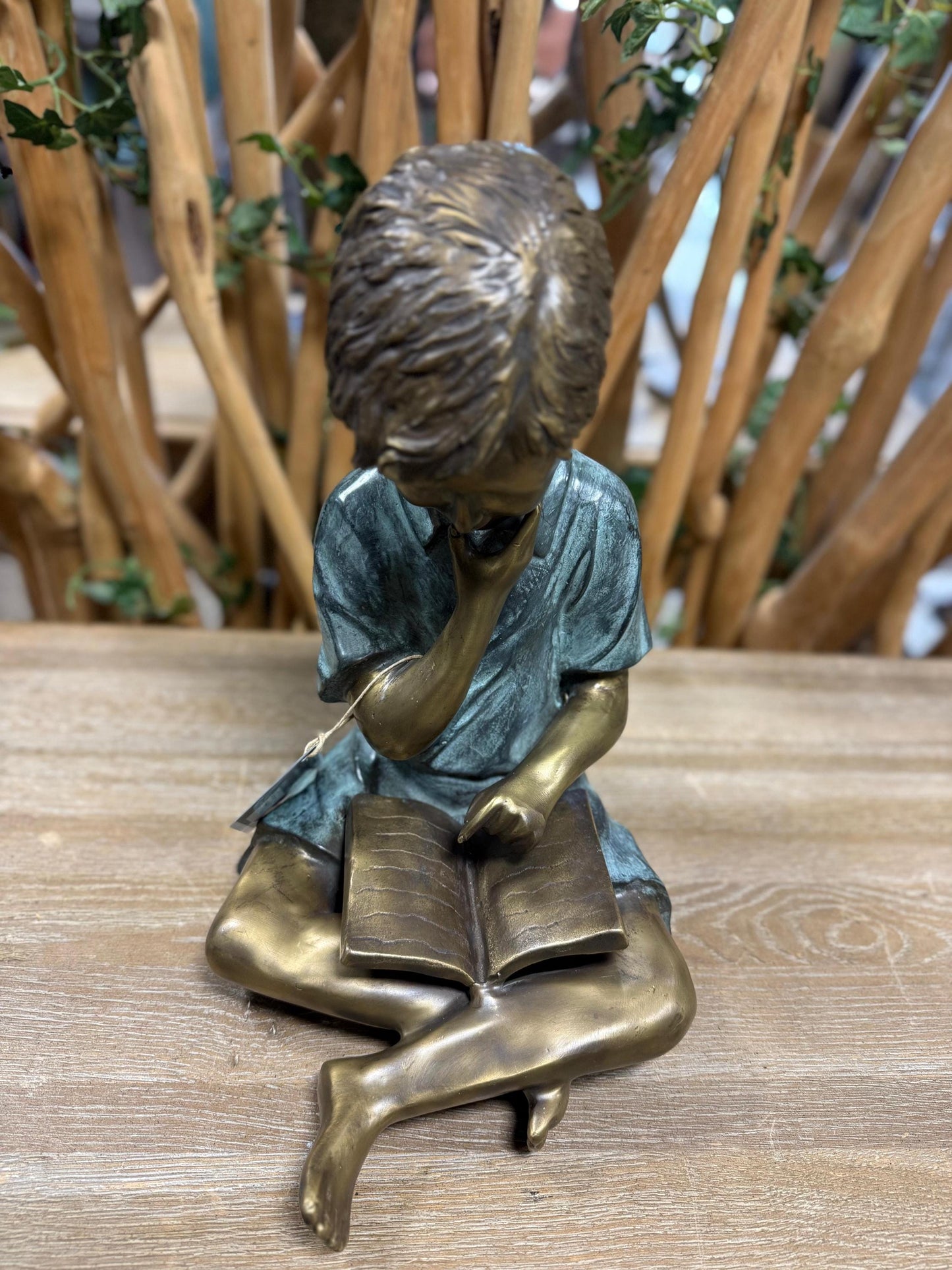 Curious Reader – Bronze Sculpture. 32x24x40cm