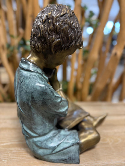 Curious Reader – Bronze Sculpture. 32x24x40cm
